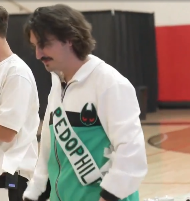 sash with the word 'pedophile' written on it